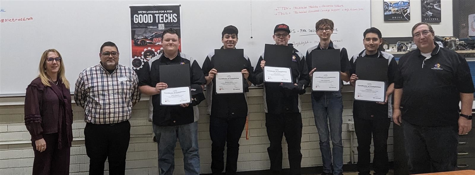 Students each Toyota TECS certificates